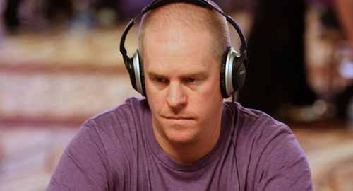 Erick Lindgren in headphones at the table